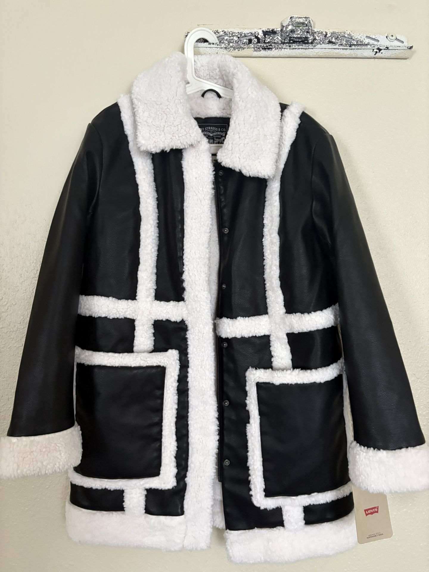 Levi’s Black and white faux leather Sherpa coat