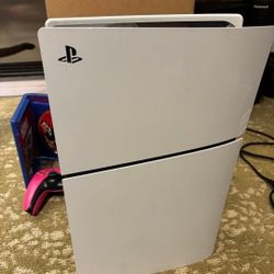 PS5 with two games and 3 controllers