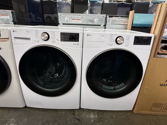 New open box LG white front load washer and gas dryer set