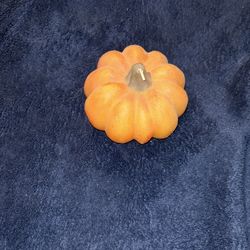 World Market Orange pumpkin candle never been  lit