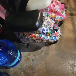 Moped scooter.