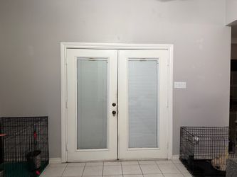 White and brown doors, including blinds