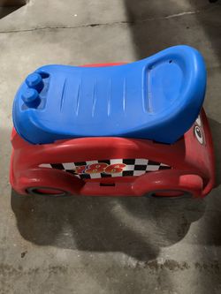 Racing car toddler toy and riding toy rider