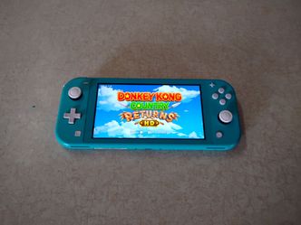 Nintendo Switch Lite + 55 Popular SWITCH Games