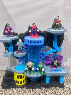 Fisher Price Imaginext DC Super Heroes Batman batcave and figures