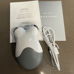 Nuface Mini With Charger & Instruction Booklet