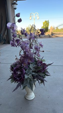 Bass with floral arrangement