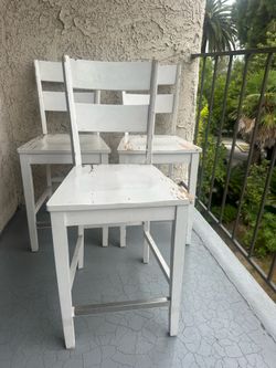 Very sturdy counter top white chairs
