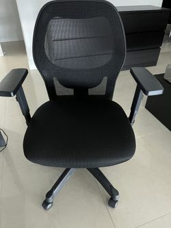 Black, adjustable office chair