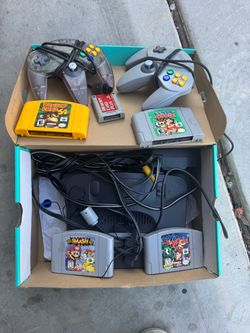 Nintendo 64 with 4 games