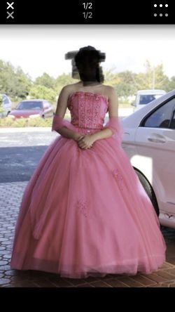 Beautiful sweet 15 dress asking $200 size small and the color watermelon