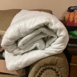 Used king size mattress pad