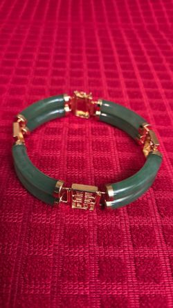 Jade Bracelet with Gold Tone Lucky Symbols