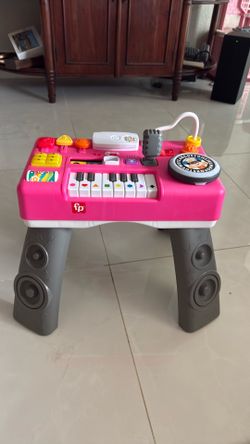 Girl piano/DJ stand