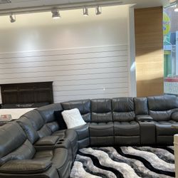 End Of Summer Clearance Sale. Madrid, Gray Leather reclining sectional only $1499. Easy finance option. Same day delivery.