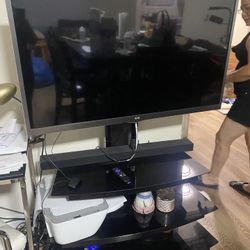tv and tv stand for sale 