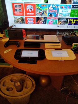 Nintendo Switch And 2 Wiius