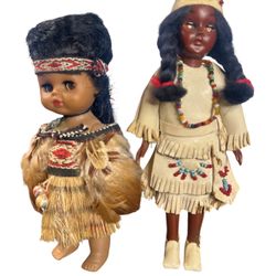 vintage 7-inch handmade Native American girl doll by Carlson Dolls. This exquisite doll is a Comanche princess, complete with a baby. Her medium dark 