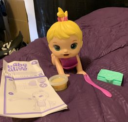 Brand New Never Played With BABY ALIVE WITH REMOVABLE BIB