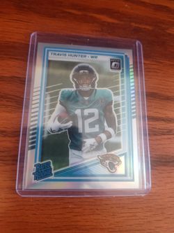 2025 Panini Donruss Optic Travis Hunter Rated Rookie RC Holo Prizm #201 Jaguars