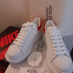 Alexander McQueen red heel Sneaker