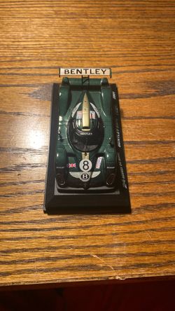 This is a scale model of the Bentley Speed 8 racing car that competed in the 24 Hours of Le Mans