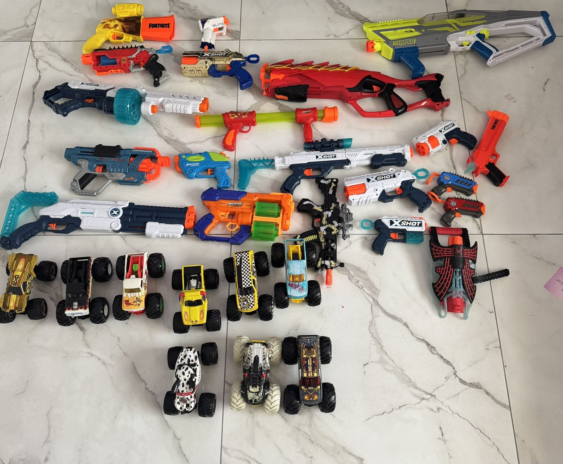 20 Nerf Guns and 9 Monster Trucks