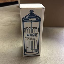 Barbers - Barbicide disinfectant jar.