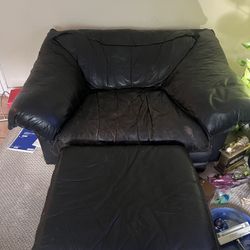 Black Leather Love Seat With Foot Stand