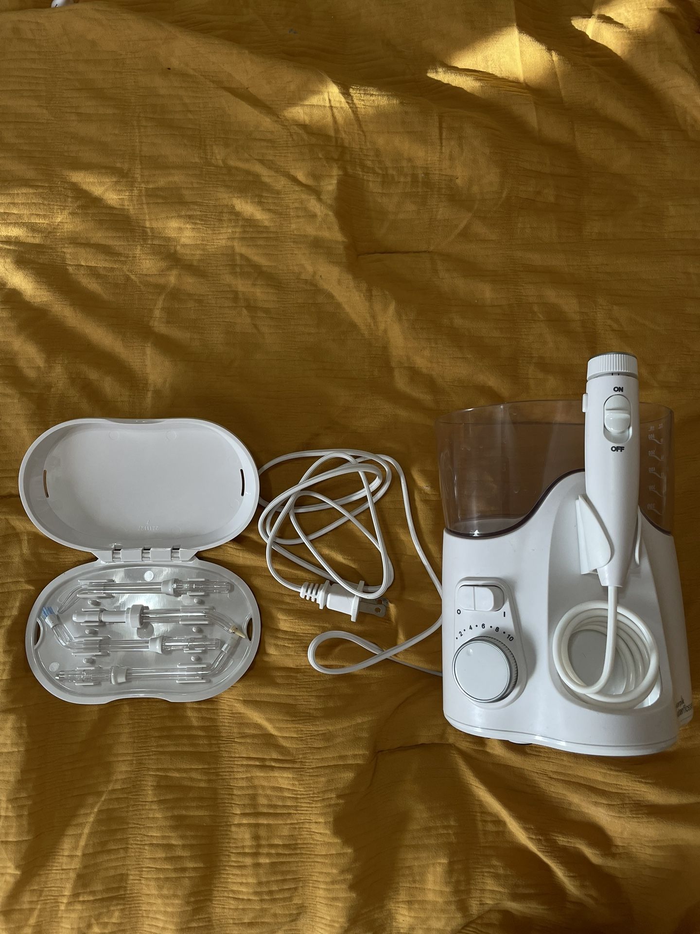 water flosser/ waterpik