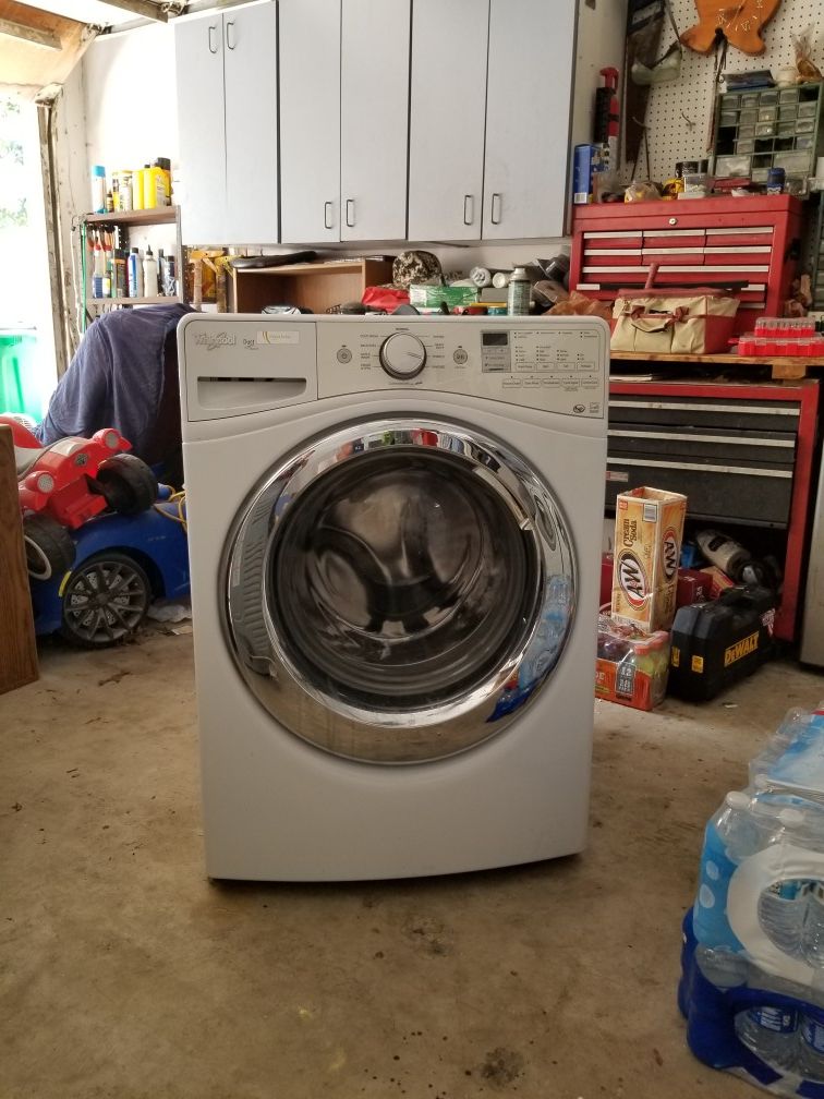 LG dryer, Whirlpool washer, mirror, 55 in rear projection tv