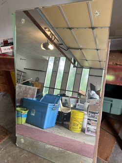 FREE 36” x 60” beveled wall mirror