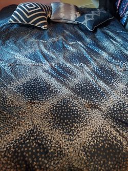 1 queen-size bedspread, 3 decorative pillows, 2 headboard covers