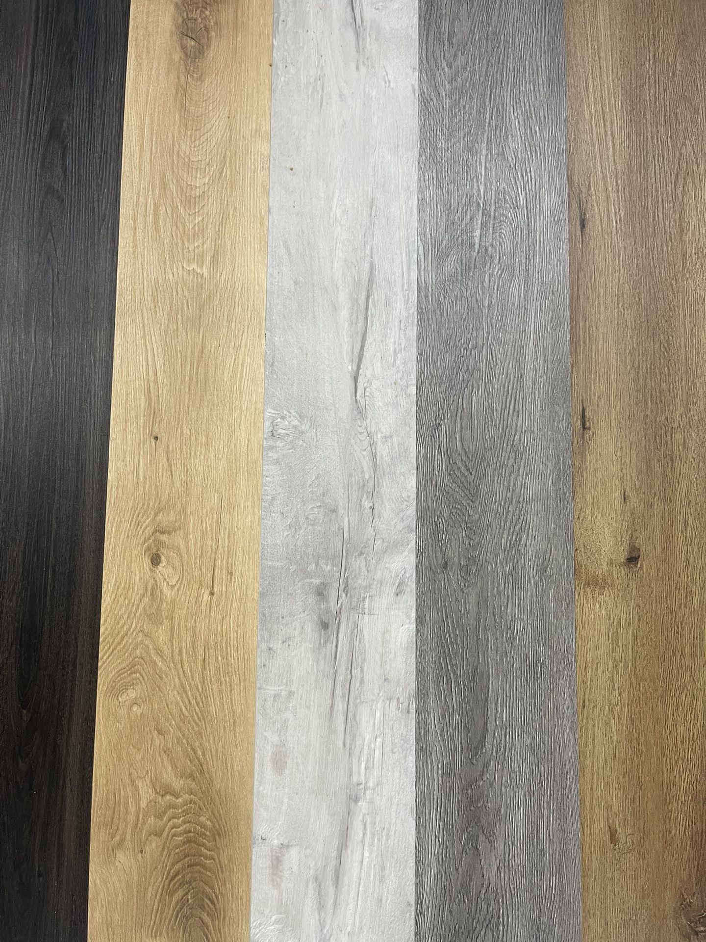 Vinyl SPC Max22 Floorings $1.79•5mm -Thickness •Padding attached •100% waterproof •Size:7.13” X48” •22 mil wear layer •Rigid core •European Collect