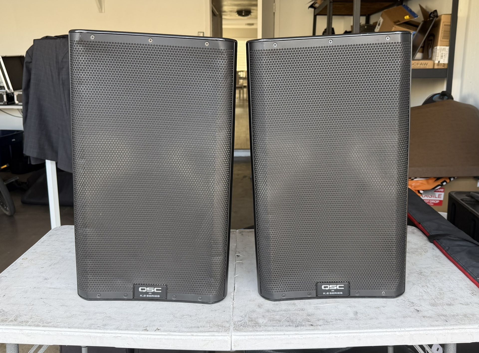 QSC K12.2 Powered Speakers (Pair) + Padded Cases – Excellent Condition