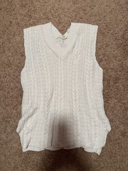 White sweater vest