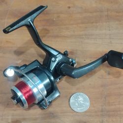 Tiny TF20 500 Size Microlite Fishing Reel
