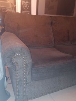 Brown loveseat