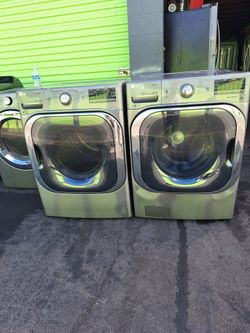 LG STEAM SET WASHER AND GAS DRYER FRONT LOAD STAINLESS STEEL