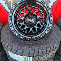 17x9 6x139.7 Wheels XM701 Gloss Black Tire 265/70/17 Kumho RT