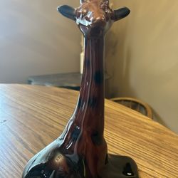 giraffe - approx 10.5" tall / glazed ceramic laying giraffe