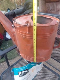 Vintage metal watering can