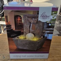 Rolling ball water fountain
