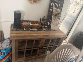 TV stand used as coffee bar
