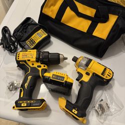 Dewalt 20 volt set with 1/4” impact gun, 1/2” drill, 2Ah battery, charger and bag