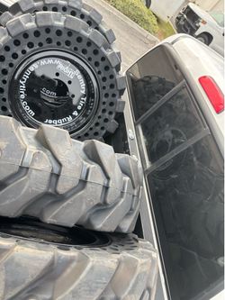 4 solid tires 12x16.5 $2500