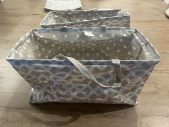 Collapsible storage bins with handles organizing totes