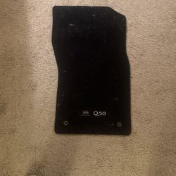 4 carpeted floor matts from a 2017 Q50 Infiniti