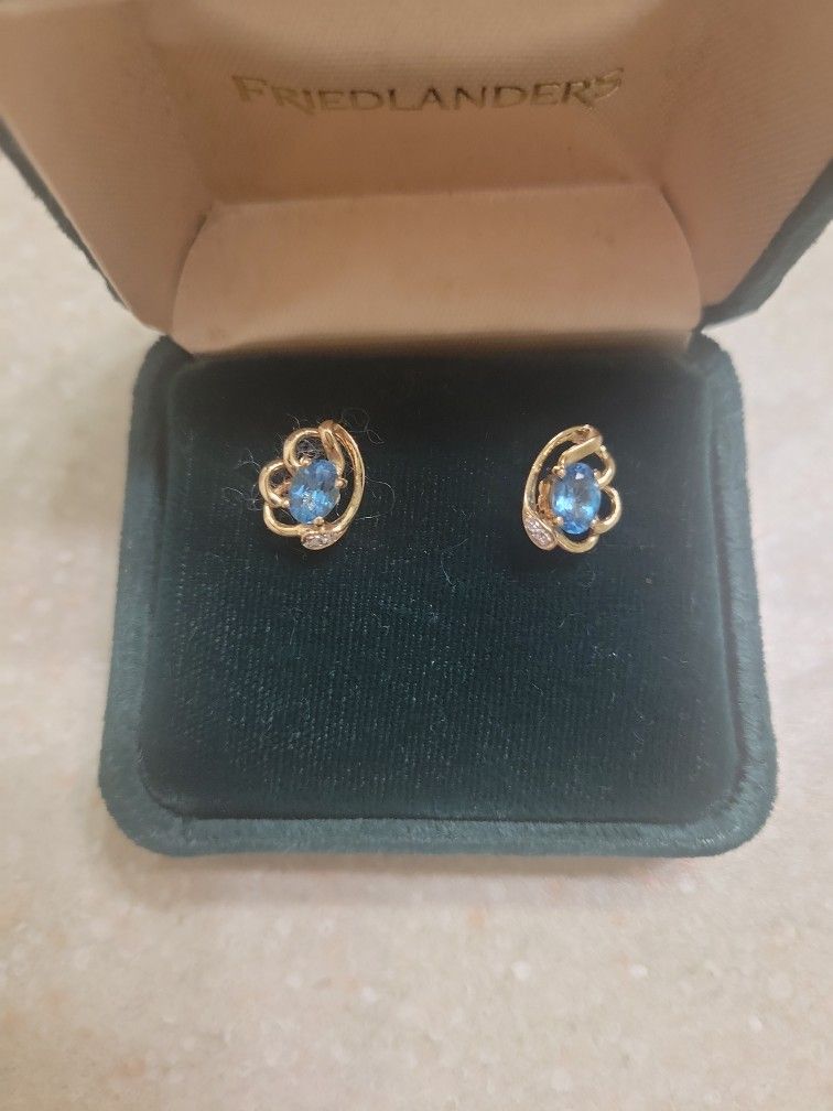 14 K Gold Earrings With Topaz and Diamonds. Weight Is 2 Grams