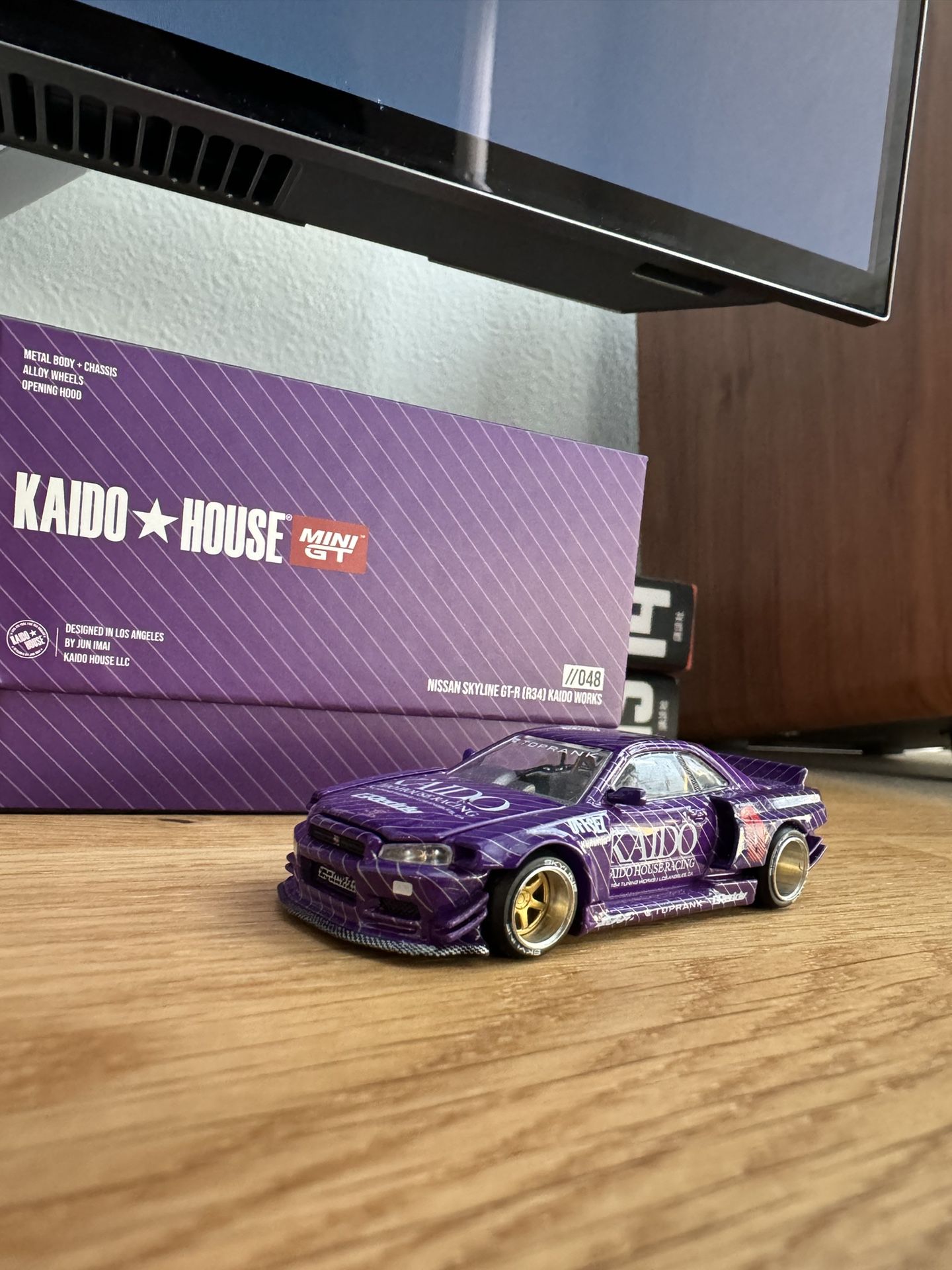 Kaido House Mini GT Nissan Skyline R34 GT-R, purple V1 KHMG048
